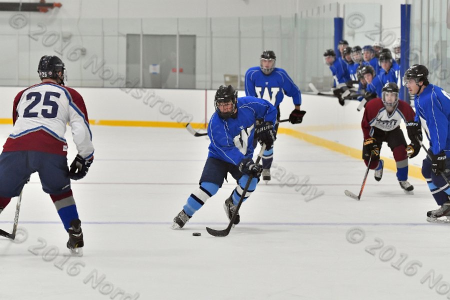 Wheaton College Men\'s Ice Hockey vs Middlesex Community College. - Photo By: KEITH NORDSTROM